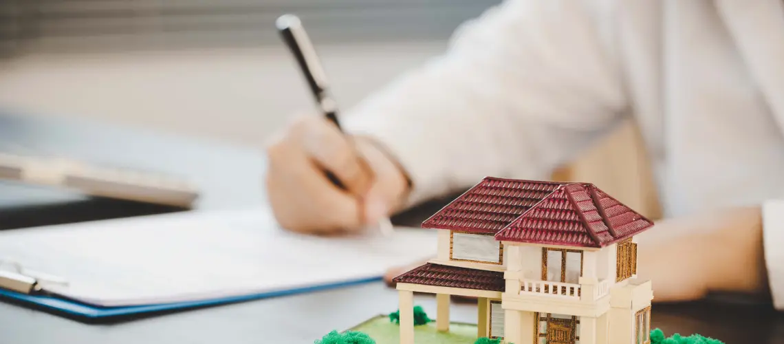 Professional valuer in Perth conducting property valuation at suburban home